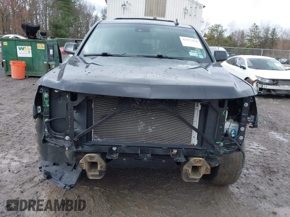 2018 Chevrolet Tahoe LT z VIN 1GNSKBKC7JR276427, wystawiony jako IAAI lot #41977418 z przebiegiem 152 007 mil mil oraz . Historia ofert i sprzedaży dostępna na DreamBid. Obrazek 12.