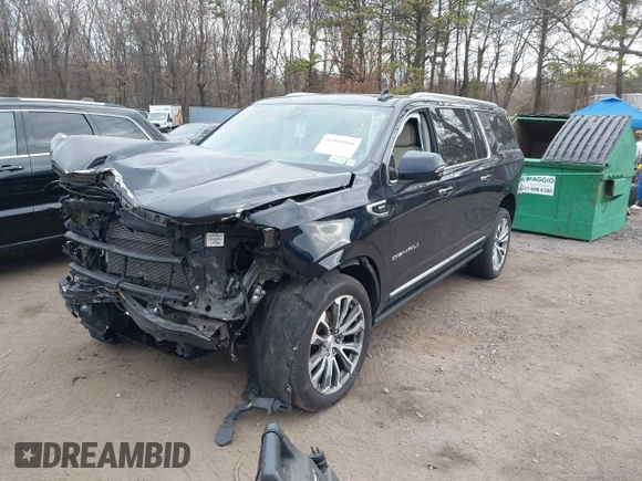 2021 GMC Yukon XL Denali with VIN 1GKS2JKL5MR290077, listed as a IAAI auction lot 41995590 with 82,939 mi miles. Bid and sale history available at carsss.com. Image 2.