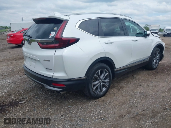 2021 Honda CR-V Touring with VIN 5J6RW2H93ML012016, listed as a IAAI auction lot 42365715 with 55,114 mi miles and . Bid and sale history available at DreamBid. Image 4.