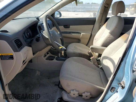 2006 Hyundai Accent GLS z VIN KMHCN46C56U050963, wystawiony jako Copart lot #60979955 z przebiegiem Nie podano mil oraz Czysty tytuł • Clean title. Historia ofert i sprzedaży dostępna na DreamBid. Obrazek 7.