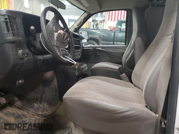 2014 Chevrolet Express Cargo Van with VIN 1GCWGFCA0E1131959, listed as a Copart auction lot 79602464 with 0 mi miles and Salvage Title. Bid and sale history available at carsss.com. Image 7.