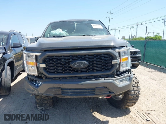 2021 Ford F-150 XL z VIN 1FTFW1E59MFA21578, wystawiony jako IAAI lot #42007968 z przebiegiem 74 025 mil mil oraz . Historia ofert i sprzedaży dostępna na DreamBid. Obrazek 12.
