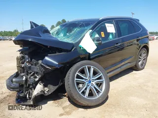 2019 Ford Edge Titanium z VIN 2FMPK3K9XKBC73014, wystawiony jako IAAI lot #42039957 z przebiegiem Nie podano mil oraz . Historia ofert i sprzedaży dostępna na DreamBid. Obrazek 2.