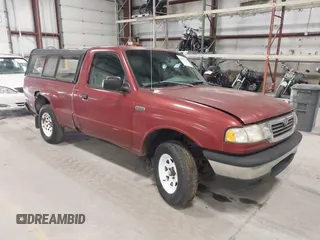 1999 Mazda B-Series 2WD Truck SX with VIN 4F4YR12C8XTM08476, listed as a IAAI auction lot 41864144 with 187,847 mi miles. Bid and sale history available at carsss.com. Image 1.