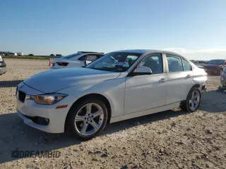 2014 BMW 3 Series 328i xDrive with VIN WBA3B5G5XENS07962, listed as a Copart auction lot 56357205 with 105,641 mi miles and Salvage title. Bid and sale history available at DreamBid. Image 1.