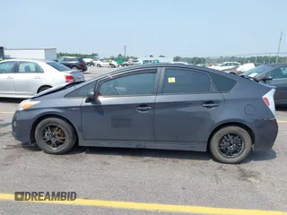 2015 Toyota Prius Four with VIN JTDKN3DU3F0458455, listed as a IAAI auction lot 42389286 with 215,703 mi miles and . Bid and sale history available at DreamBid. Image 14.