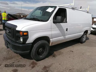 2010 Ford Econoline Cargo Commercial with VIN 1FTNE2EW0ADA98103, listed as a IAAI auction lot 41735290 with 143,717 mi miles and . Bid and sale history available at DreamBid. Image 2.