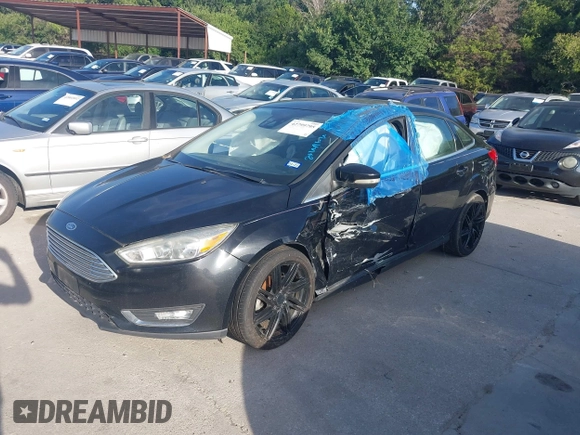 2016 Ford Focus Titanium with VIN 1FADP3J26GL335843, listed as a IAAI auction lot 42799795 with 167,506 mi miles and . Bid and sale history available at DreamBid. Image 2.