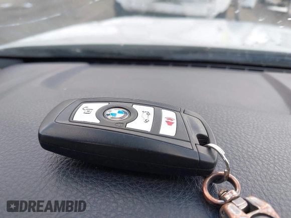 2013 BMW 5 Series 550i with VIN WBAFR9C55DDX79824, listed as a IAAI auction lot 41703036 with 107,166 mi miles and . Bid and sale history available at carsss.com. Image 11.