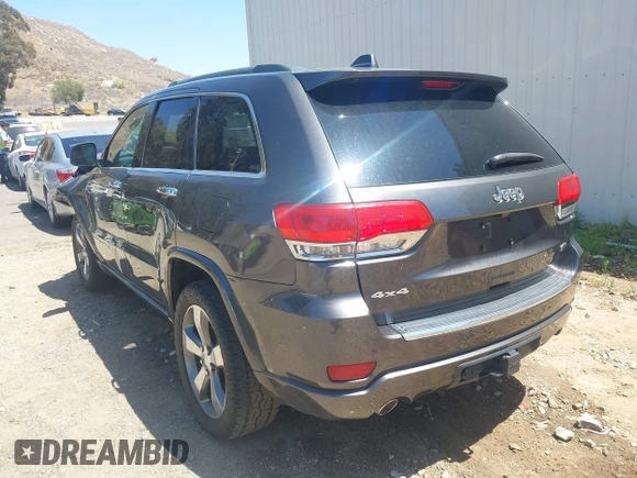 2015 Jeep Grand Cherokee Overland with VIN 1C4RJFCG7FC839778, listed as a IAAI auction lot 42490111 with 160,040 mi miles and . Bid and sale history available at DreamBid. Image 3.