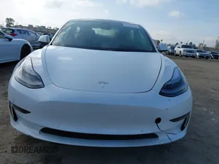2022 Tesla Model 3 with VIN 5YJ3E1EA1NF167711, listed as a IAAI auction lot 41594266 with 50,554 mi miles and . Bid and sale history available at DreamBid. Image 12.