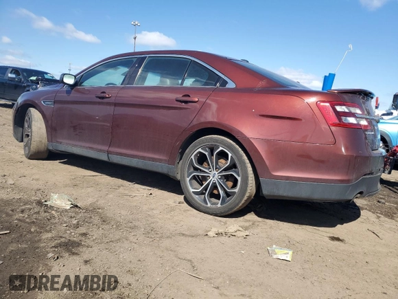 2016 Ford Taurus SHO z VIN 1FAHP2KT6GG140921, wystawiony jako Copart lot #52118935 z przebiegiem 132 199 mil mil oraz Czysty tytuł • Clean title. Historia ofert i sprzedaży dostępna na DreamBid. Obrazek 2.