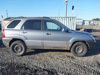 2006 Kia Sportage LX with VIN KNDJE723X67242610, listed as a IAAI auction lot 41735144 with 244,979 mi miles and . Bid and sale history available at DreamBid. Image 13.
