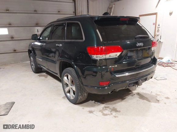 2014 Jeep Grand Cherokee Overland with VIN 1C4RJFCGXEC162109, listed as a IAAI auction lot 41943979 with 147,788 mi miles. Bid and sale history available at carsss.com. Image 3.