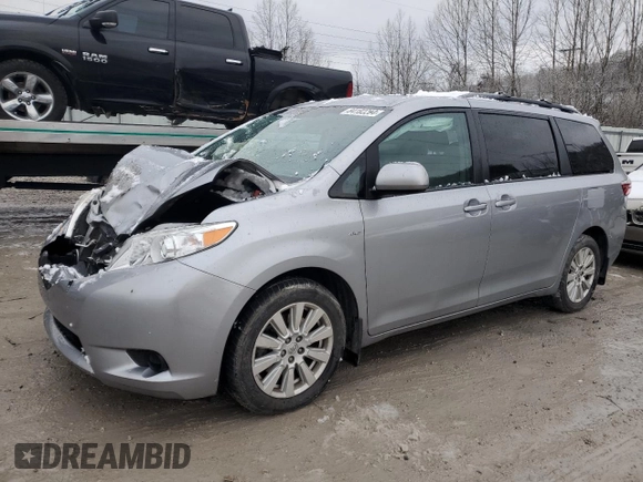 2017 Toyota Sienna LE with VIN 5TDJZ3DC5HS187003, listed as a Copart auction lot 84182284 with 85,045 mi miles and Salvage Title. Bid and sale history available at carsss.com. Image 1.