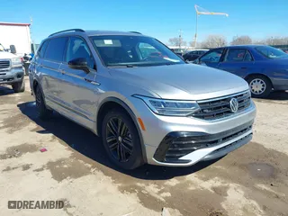 2022 Volkswagen Tiguan SE R-Line Black with VIN 3VVCB7AX4NM008121, listed as a IAAI auction lot 41671382 with 71,674 mi miles. Bid and sale history available at carsss.com. Image 1.