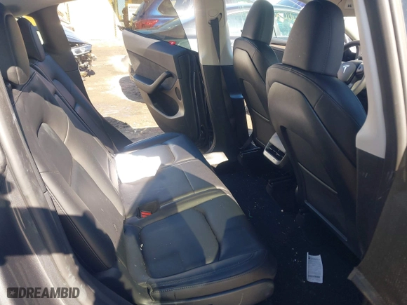 2023 Tesla Model Y Long Range with VIN 7SAYGAEE9PF905943, listed as a IAAI auction lot 41444255 with 11,179 mi miles. Bid and sale history available at carsss.com. Image 8.