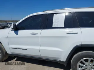 2021 Jeep Grand Cherokee Laredo E with VIN 1C4RJFAG5MC579865, listed as a IAAI auction lot 41818874 with 105,489 mi miles and . Bid and sale history available at DreamBid. Image 14.