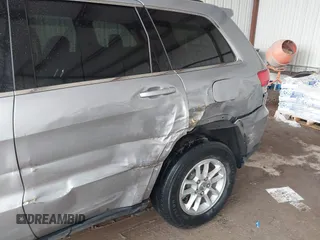 2018 Jeep Grand Cherokee Laredo E with VIN 1C4RJEAG1JC275356, listed as a IAAI auction lot 42150422 with 69,720 mi miles and . Bid and sale history available at DreamBid. Image 6.