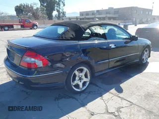 2009 Mercedes-Benz CLK-Class 3.5L with VIN WDBTK56GX9T107902, listed as a IAAI auction lot 41867771 with 134,939 mi miles. Bid and sale history available at carsss.com. Image 4.