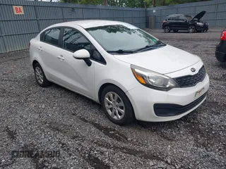 2013 Kia Rio LX z VIN KNADM4A3XD6209929, wystawiony jako IAAI lot #42528203 z przebiegiem 152 969 mil mil oraz . Historia ofert i sprzedaży dostępna na DreamBid. Obrazek 1.
