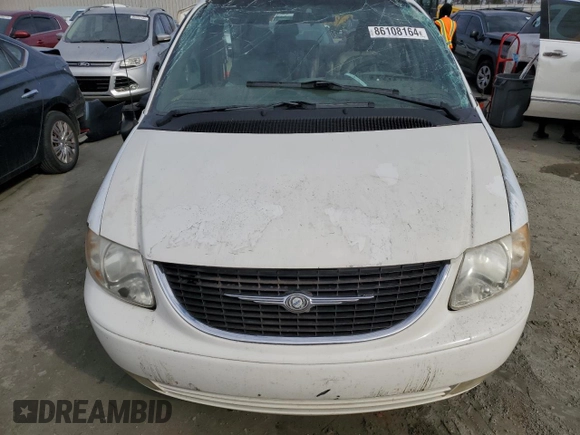 2001 Chrysler Town & Country LXi with VIN 2C8GP54L11R402563, listed as a Copart auction lot 86108164 with 179,021 mi miles and Salvage Title. Bid and sale history available at DreamBid. Image 5.