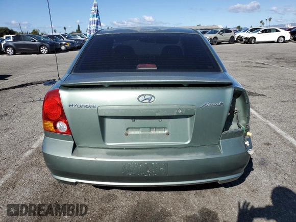 2004 Hyundai Accent GL with VIN KMHCG45C44U533952, listed as a Copart auction lot 51181095 with 88,446 mi miles and Salvage Title. Bid and sale history available at carsss.com. Image 6.