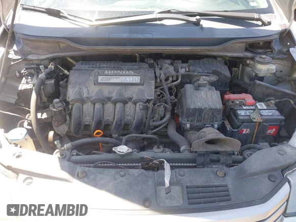 2010 Honda Insight EX with VIN JHMZE2H74AS041533, listed as a IAAI auction lot 42675766 with 203,357 mi miles and . Bid and sale history available at DreamBid. Image 10.