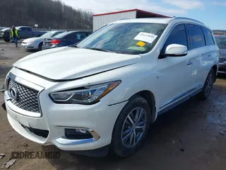 2020 Infiniti QX60 LUXE with VIN 5N1DL0MM0LC513849, listed as a IAAI auction lot 41633049 with 65,413 mi miles. Bid and sale history available at carsss.com. Image 19.