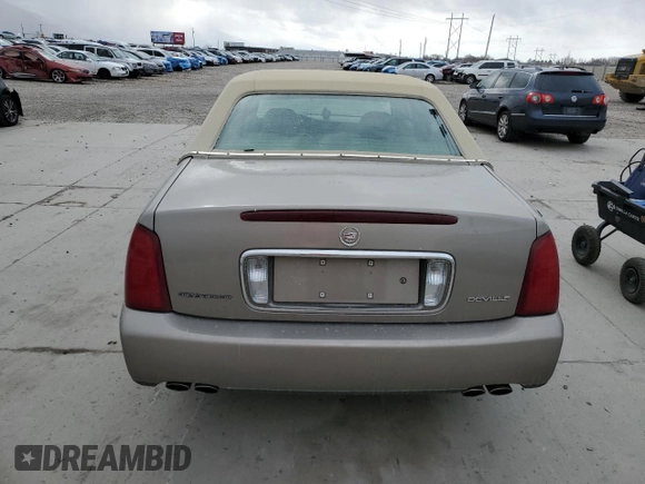 2003 Cadillac DeVille with VIN 1G6KD54Y83U111244, listed as a Copart auction lot 45117065 with 94,580 mi miles and Salvage Title. Bid and sale history available at carsss.com. Image 6.