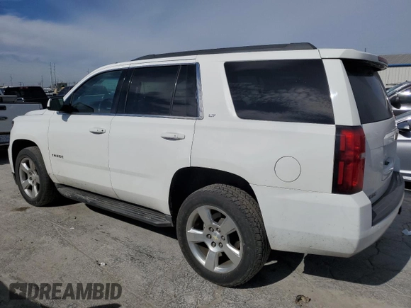 2015 Chevrolet Tahoe z VIN 0K0735576064, wystawiony jako Copart lot #41356164 z przebiegiem 124 281 mil mil oraz Czysty tytuł • Clean title. Historia ofert i sprzedaży dostępna na DreamBid. Obrazek 2.