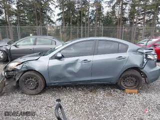 2012 Mazda Mazda3 i Sport with VIN JM1BL1UF5C1528944, listed as a IAAI auction lot 41935087 with 115,983 mi miles. Bid and sale history available at carsss.com. Image 6.