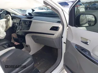 2014 Toyota Sienna SE with VIN 5TDXK3DC1ES422510, listed as a IAAI auction lot 41030376 with Not Provided miles and . Bid and sale history available at DreamBid. Image 5.