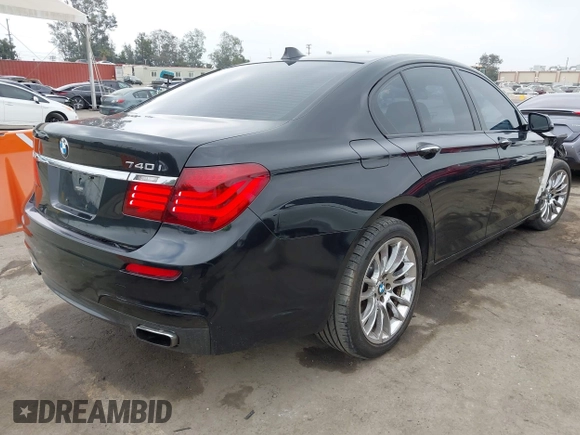 2015 BMW 7 Series 740i with VIN WBAYA6C54FG273188, listed as a IAAI auction lot 42563572 with 70,675 mi miles and . Bid and sale history available at DreamBid. Image 4.