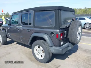 2020 Jeep Wrangler Unlimited Sport Altitude with VIN 1C4HJXDG7LW215344, listed as a IAAI auction lot 41924460 with 51,802 mi miles and . Bid and sale history available at DreamBid. Image 3.