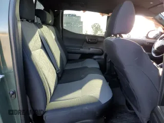 2021 Toyota Tacoma SR5 z VIN 3TMAZ5CN6MM157145, wystawiony jako Copart lot #51641085 z przebiegiem Nie podano mil oraz Szkoda całkowita • Salvage title. Historia ofert i sprzedaży dostępna na DreamBid. Obrazek 10.