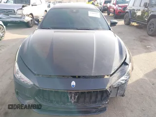 2021 Maserati Ghibli S with VIN ZAM57YSA3M1365483, listed as a IAAI auction lot 41488486 with 51,954 mi miles and . Bid and sale history available at DreamBid. Image 12.