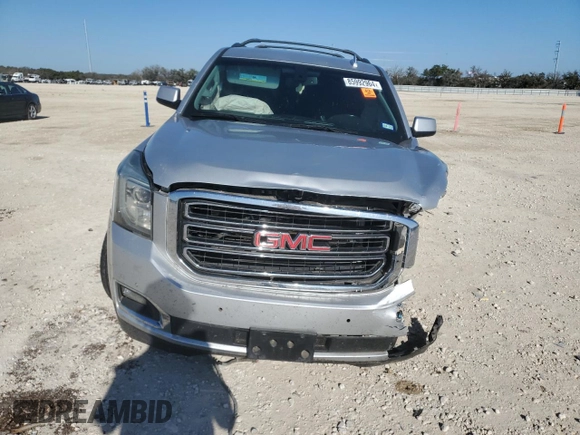 2015 GMC Yukon SLE with VIN 1GKS1AKC1FR716322, listed as a Copart auction lot 85992964 with 141,552 mi miles and Salvage Title. Bid and sale history available at carsss.com. Image 5.