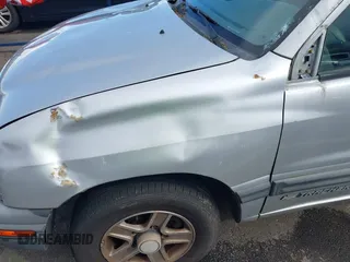 2003 Chevrolet Tracker with VIN 2CNBJ13C336946019, listed as a IAAI auction lot 41814810 with 112,317 mi miles and . Bid and sale history available at DreamBid. Image 6.