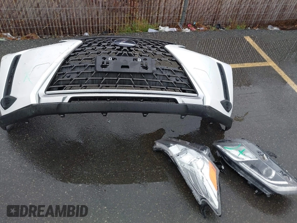 2022 Lexus UX 250h z VIN JTHX9JBH5N2056118, wystawiony jako IAAI lot #41538359 z przebiegiem 32 699 mil mil oraz . Historia ofert i sprzedaży dostępna na DreamBid. Obrazek 12.