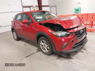 2018 Mazda CX-3 Sport z VIN JM1DKFB71J0312631, wystawiony jako IAAI lot #42115914 z przebiegiem 100 803 mil mil oraz . Historia ofert i sprzedaży dostępna na DreamBid. Obrazek 1.