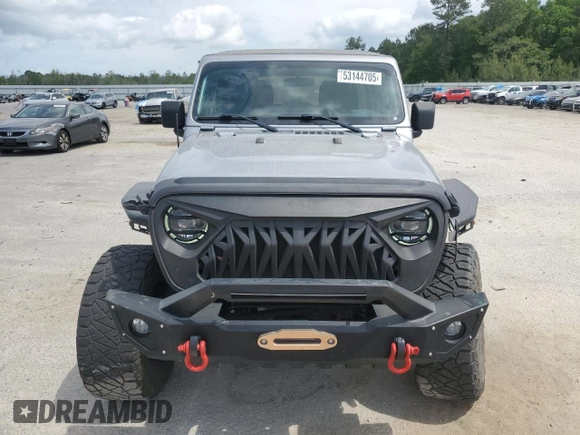 2020 Jeep Wrangler Unlimited Willys z VIN 1C4HJXDG5LW216718, wystawiony jako Copart lot #53144705 z przebiegiem 27 932 mil mil oraz Czysty tytuł • Clean title. Historia ofert i sprzedaży dostępna na DreamBid. Obrazek 5.