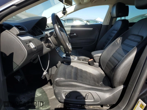 2013 Volkswagen CC R-Line with VIN WVWBP7AN0DE553831, listed as a Copart auction lot 61788784 with 134,430 mi miles and Salvage Title. Bid and sale history available at carsss.com. Image 7.