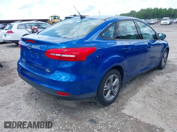 2018 Ford Focus SE with VIN 1FADP3FE8JL238024, listed as a IAAI auction lot 42463643 with Not provided miles and . Bid and sale history available at DreamBid. Image 4.
