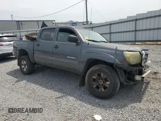 2010 Toyota Tacoma PreRunner with VIN 5TEJU4GN7AZ711911, listed as a Copart auction lot 60200385 with 209,579 mi miles and Salvage title. Bid and sale history available at DreamBid. Image 4.