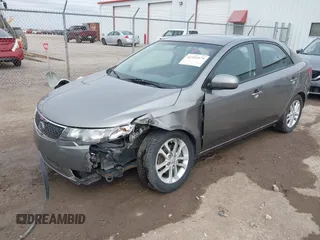 2012 Kia Forte EX with VIN KNAFU4A24C5632655, listed as a IAAI auction lot 41932379 with 146,273 mi miles. Bid and sale history available at carsss.com. Image 2.