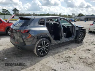 2023 Mazda CX-50 S Premium Plus with VIN 7MMVABEM2PN128862, listed as a Copart auction lot 45869665 with 23,177 mi miles and Salvage Title. Bid and sale history available at DreamBid. Image 3.