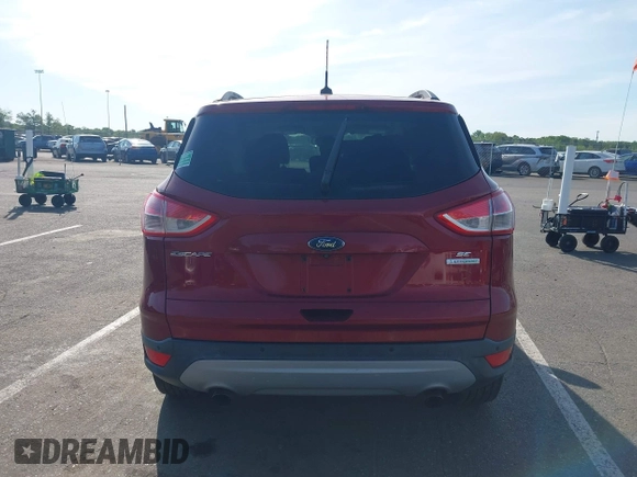 2014 Ford Escape SE z VIN 1FMCU0GX2EUB91517, wystawiony jako IAAI lot #42231093 z przebiegiem 67 436 mil mil oraz . Historia ofert i sprzedaży dostępna na DreamBid. Obrazek 17.