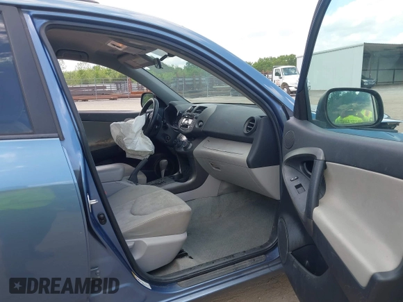 2011 Toyota RAV4 with VIN 2T3JF4DV4BW115148, listed as a IAAI auction lot 42177258 with 142,610 mi miles. Bid and sale history available at carsss.com. Image 5.