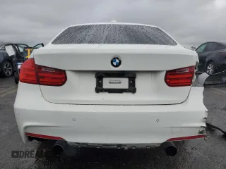 2014 BMW 3 Series 335i xDrive with VIN WBA3B9G51ENR92301, listed as a Copart auction lot 58296885 with 81,988 mi miles and Salvage title. Bid and sale history available at DreamBid. Image 6.